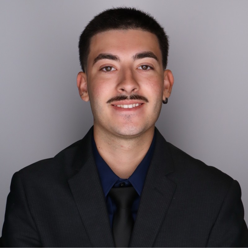 Dorian, Outreach at Sorta, in a black suit
